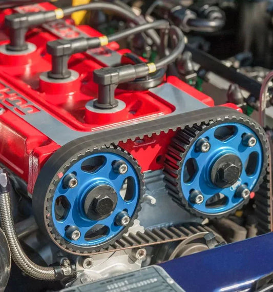 Camshaft position sensor on a heavy-duty diesel engine, mounted near the timing gear cover